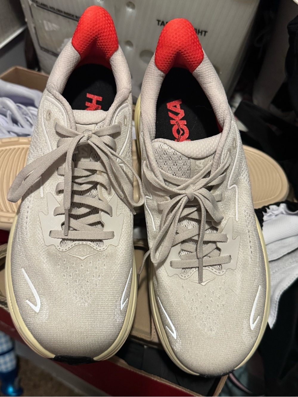 Hoka Beige Running Trainers with Red Heel Collar